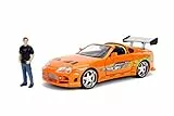 Jada - Fast and Furious Toyota Supra y Figura de Brian -1995 Toyota Supra Mk4 Modelo de Coche 1:24 Naranja con Brian O'Conner, vehículo con alerón,Apertura de Partes y Techo Desmontable (253205001)