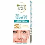 Garnier Ambre Solaire - Crema facial antiedad con protección UV para pieles sensibles, SPF 50, absorción rápida, con ácido hialurónico, 50 ml