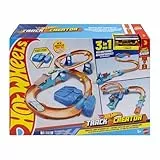 Hot Wheels Circuito Supersalto Conjunto de pista con coche de juguete, caja de construcción exclusiva con propulsor motorizado, vehículo a escala 1:64 y pista Speed Snap, JDB49