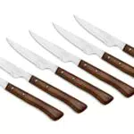Arcos Juego de 6 Cuchillos de Carne. Paquete de Cuchillos Chuleteros con Filo de Perla para Cortar y Filetear Carne. Hoja serrada Acero Inoxidable y mango madera haya. Serie Mesa