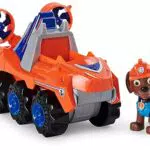 PATRULLA CANINA - COCHE DELUXE DINO RESCUE CON ACELERACIÓN + FIGURA ROCKY - Coche Patrulla Canina Rocky Dino Rescue con 1 Figura de Dinosaurio Misteriosa - 6059525 - Juguetes Niños 3 Años +